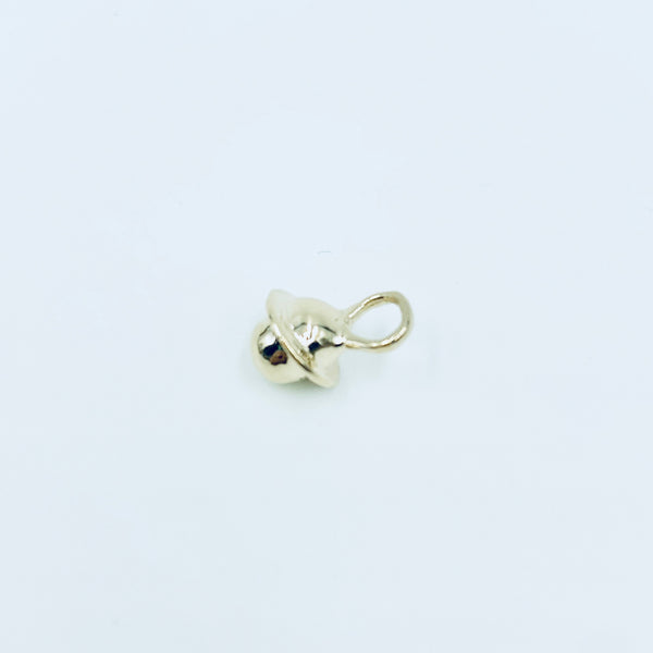 handmade fine jewelry. handmade gold charms. martine jewelry. gold jewelry. one of a kind jewelry. handmade. female owned business resort wear cool charms small gold charm planet charm saturn charm 14k gold charms  